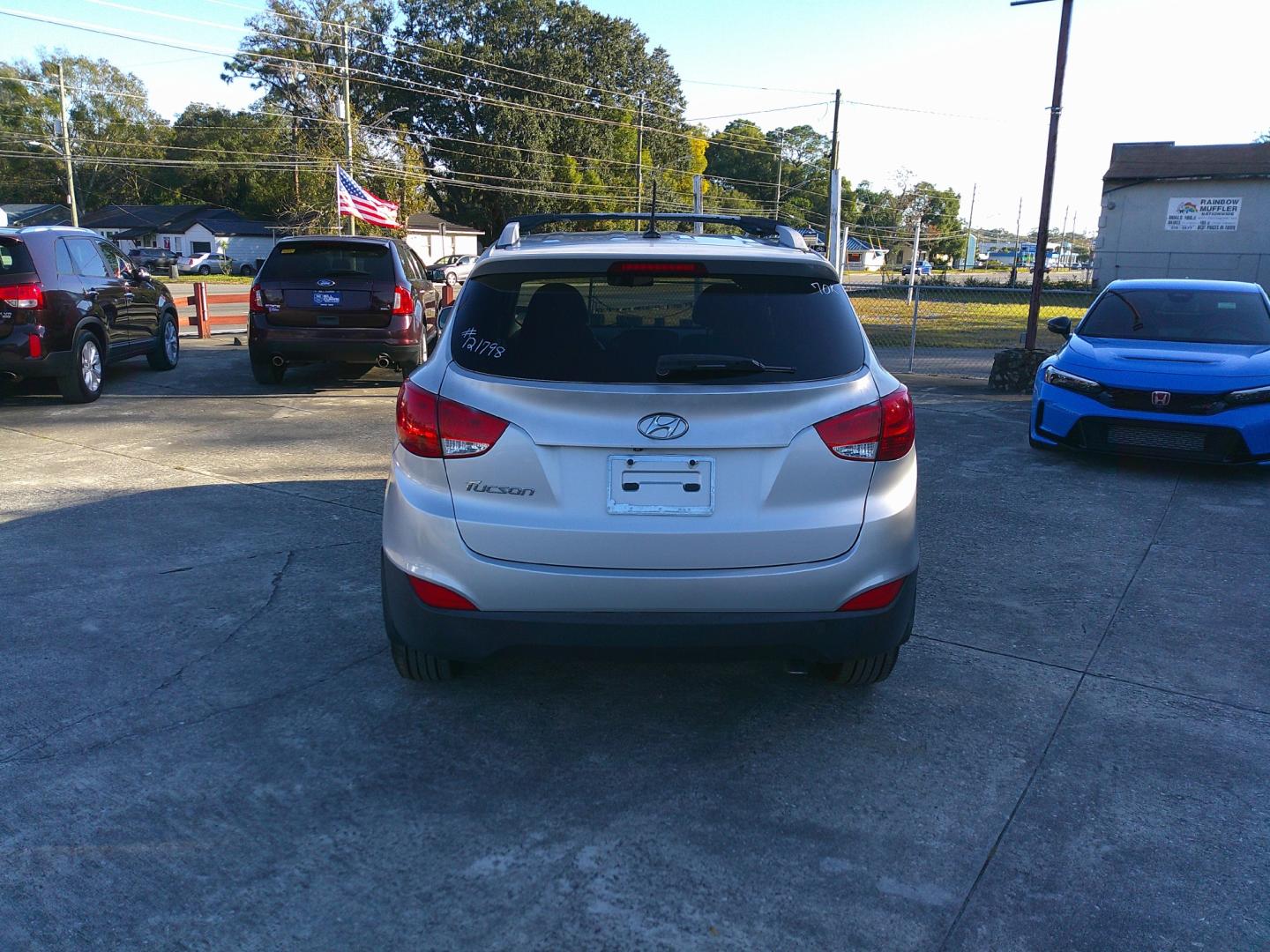 2014 SILVER HYUNDAI TUCSON LIMITED; SE (KM8JU3AG4EU) , located at 10405 Abercorn Street, Savannah, GA, 31419, (912) 921-8965, 31.988262, -81.131760 - Photo#3